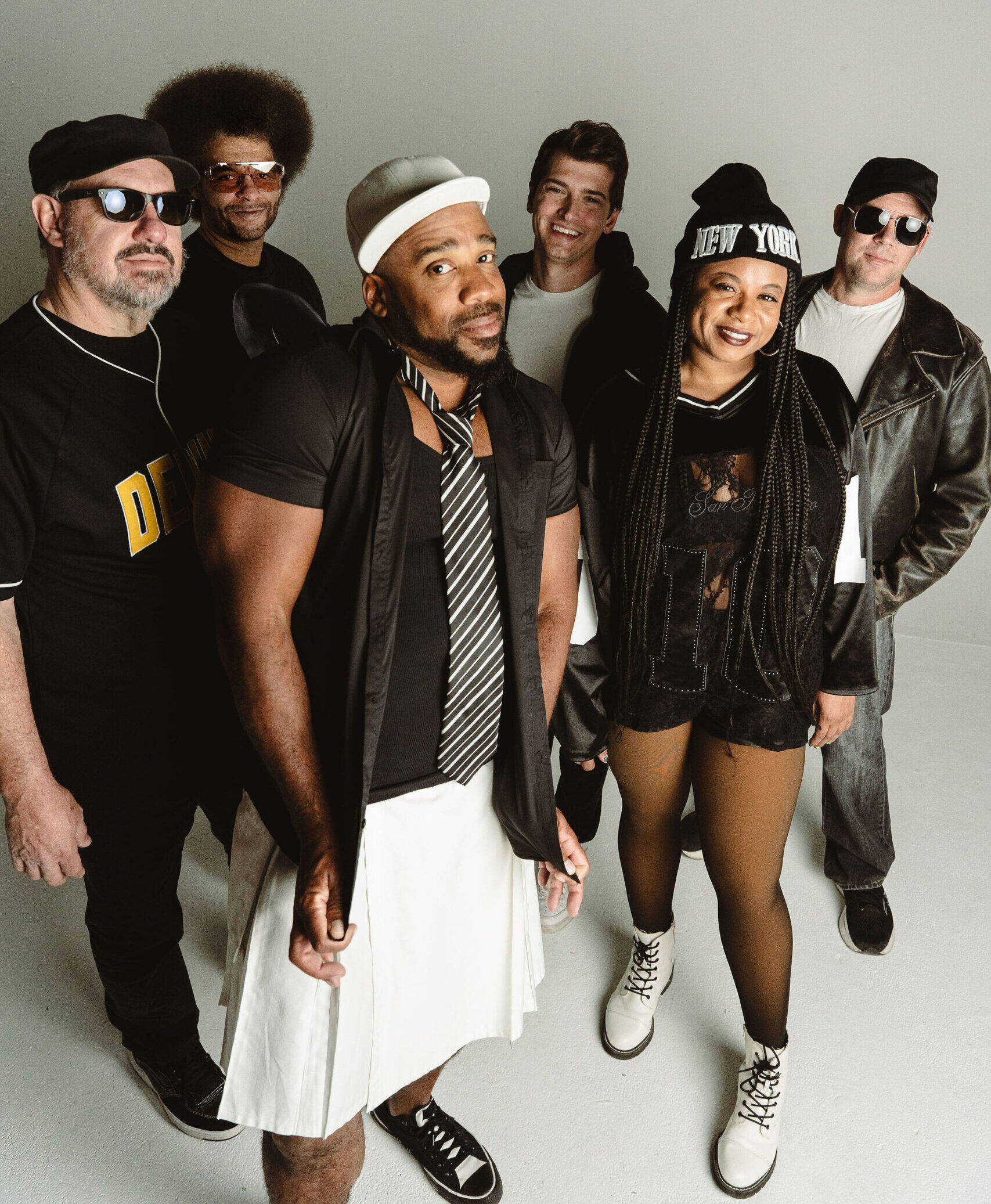 Little Moses Jones band members performing together — high-energy 90s and 2000s R&B and Hip-Hop live entertainment