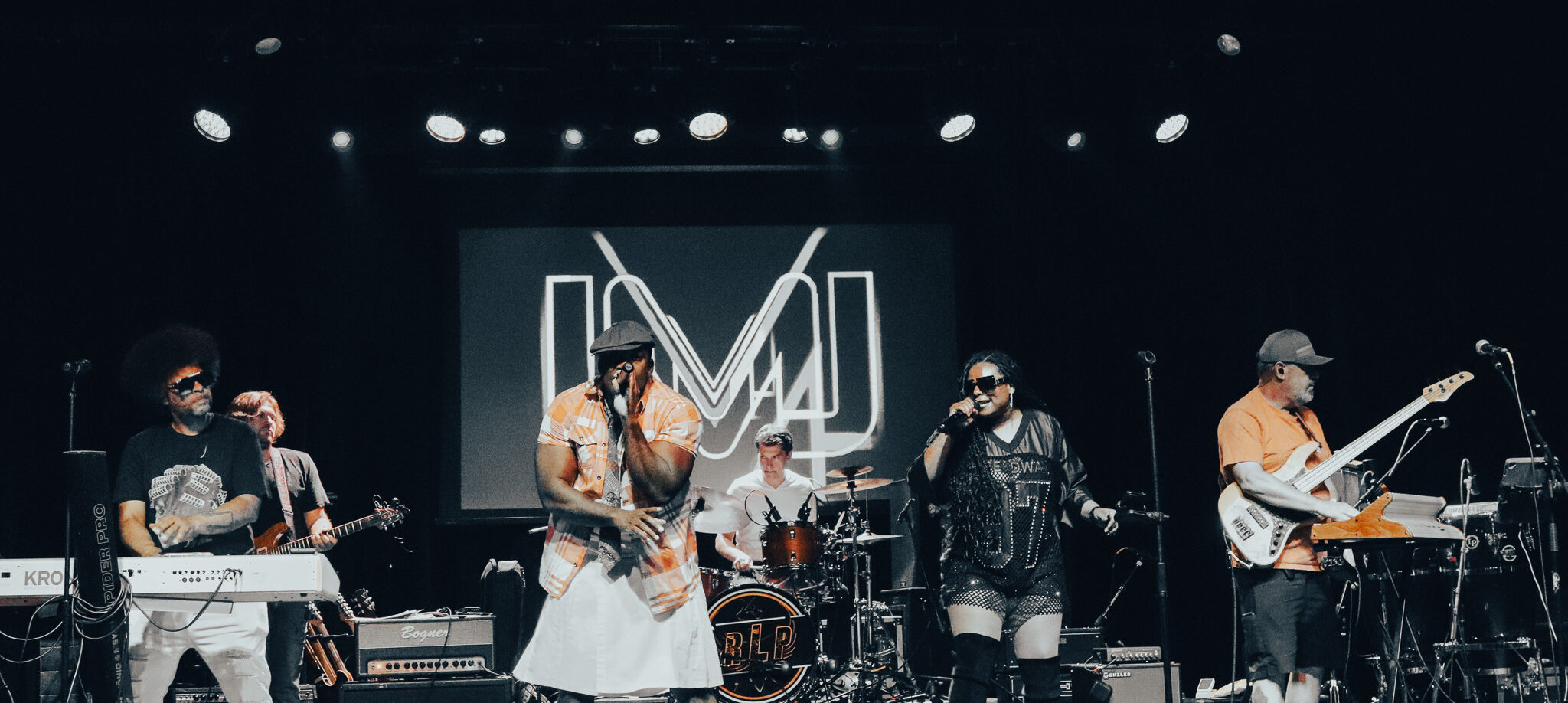 Little Moses Jones performing at a corporate event