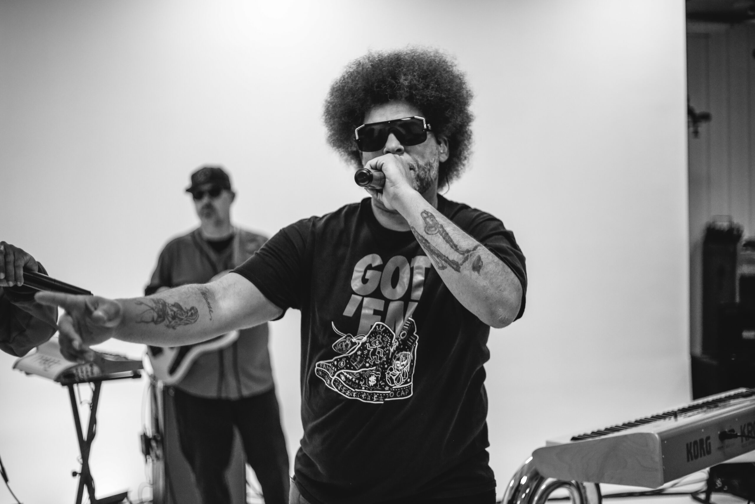 Little Moses Jones bandleader and multi-instrumentalist performing at a corporate event — live 90s and 2000s R&B and Hip-Hop entertainment